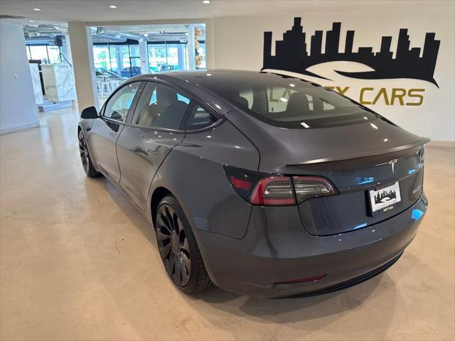 used 2022 Tesla Model 3 car, priced at $26,399
