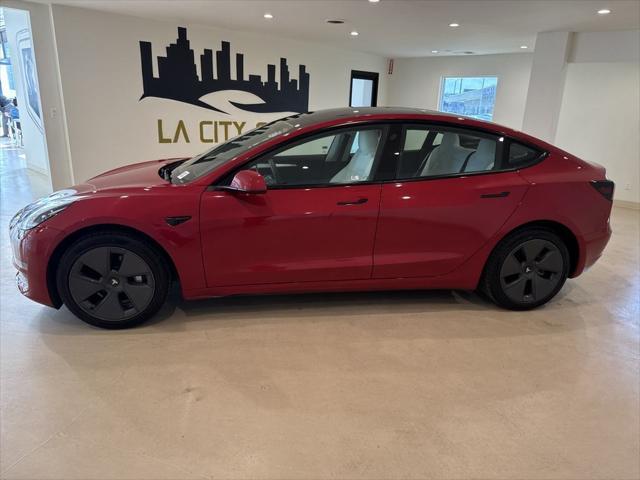 used 2023 Tesla Model 3 car, priced at $26,999