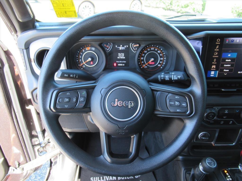 used 2024 Jeep Wrangler car, priced at $27,752