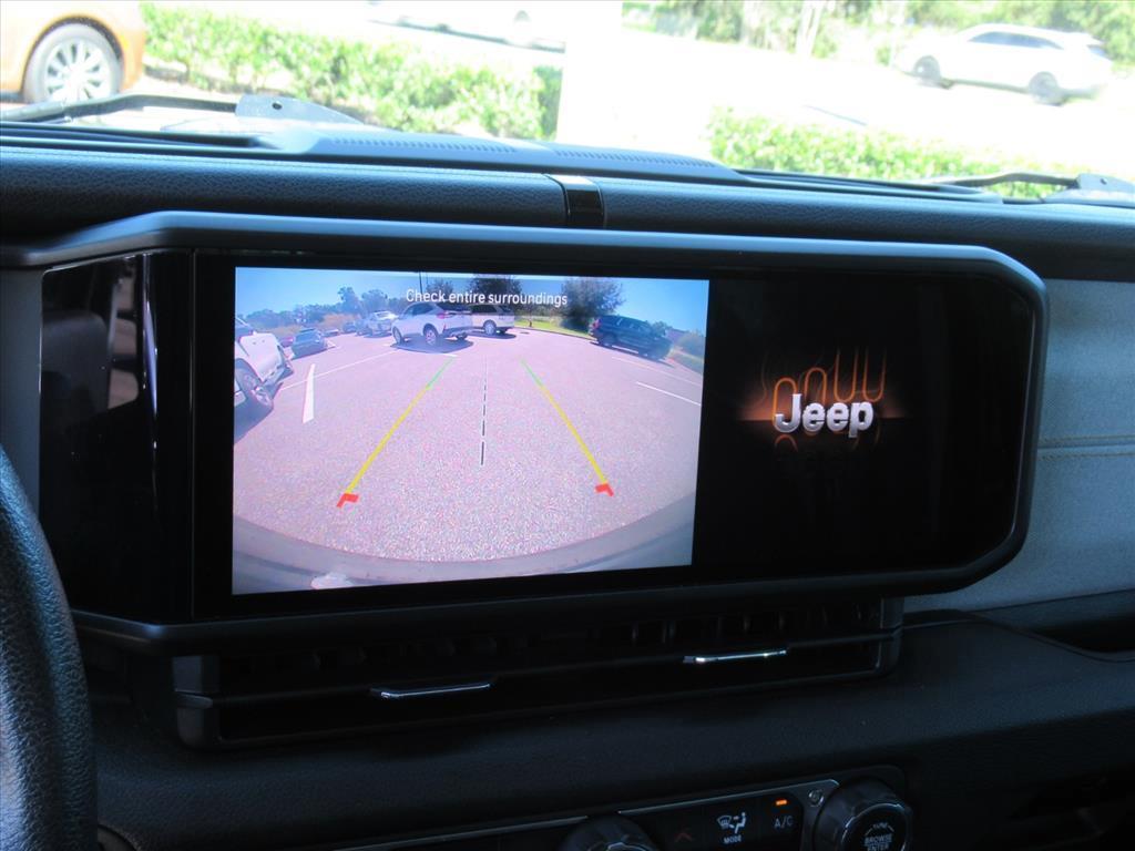 used 2024 Jeep Wrangler car, priced at $27,752