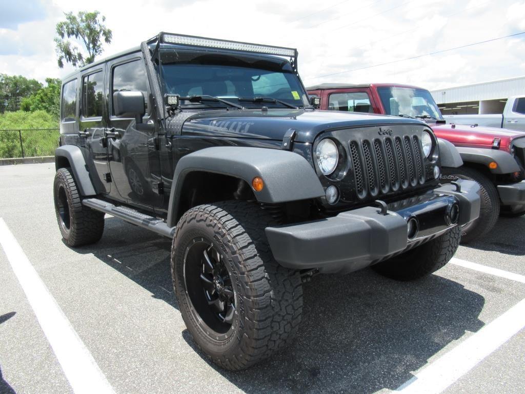used 2014 Jeep Wrangler Unlimited car, priced at $21,295