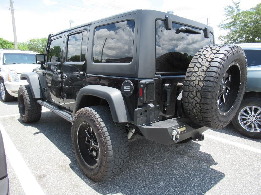 used 2014 Jeep Wrangler Unlimited car, priced at $21,295