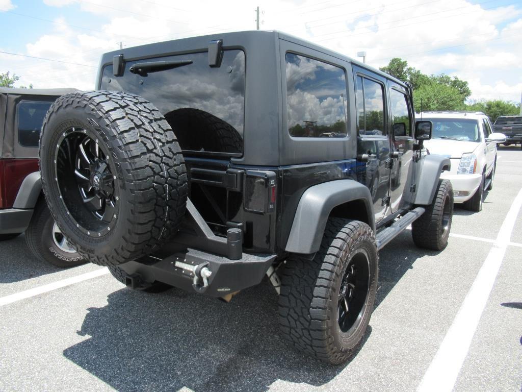 used 2014 Jeep Wrangler Unlimited car, priced at $21,295
