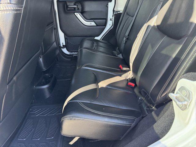 used 2015 Jeep Wrangler Unlimited car, priced at $21,991