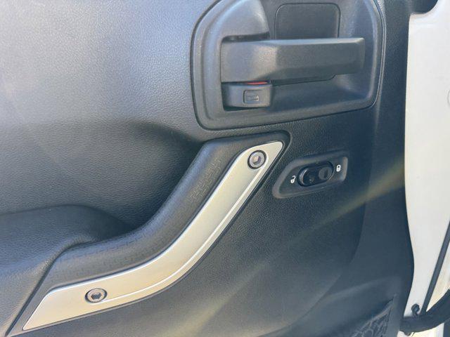 used 2015 Jeep Wrangler Unlimited car, priced at $21,991