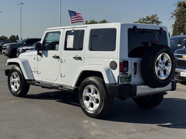 used 2015 Jeep Wrangler Unlimited car, priced at $21,991