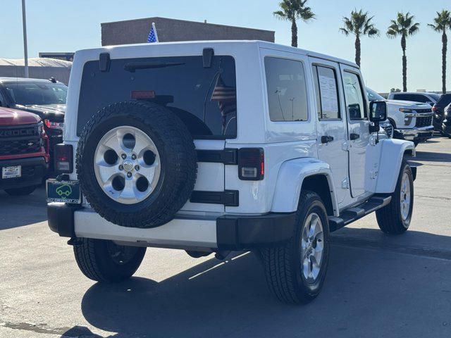 used 2015 Jeep Wrangler Unlimited car, priced at $21,991