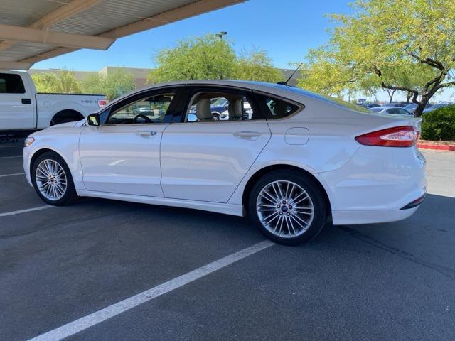 used 2015 Ford Fusion car, priced at $9,999