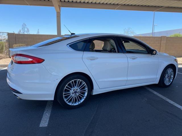 used 2015 Ford Fusion car, priced at $9,999