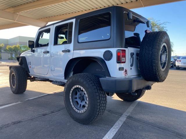 used 2014 Jeep Wrangler Unlimited car, priced at $14,891