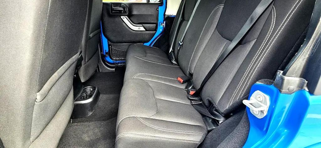 used 2015 Jeep Wrangler Unlimited car, priced at $18,700