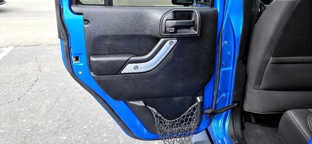 used 2015 Jeep Wrangler Unlimited car, priced at $18,700