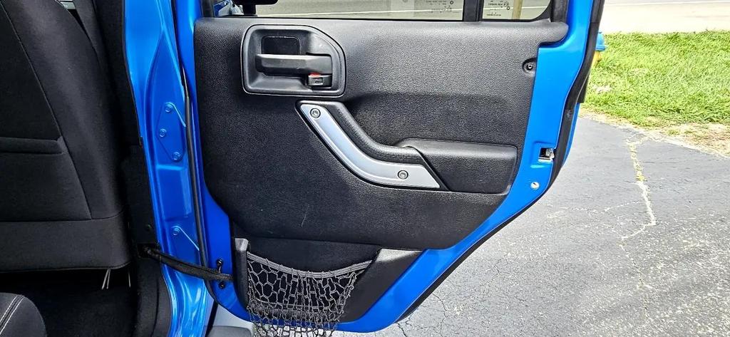 used 2015 Jeep Wrangler Unlimited car, priced at $18,700