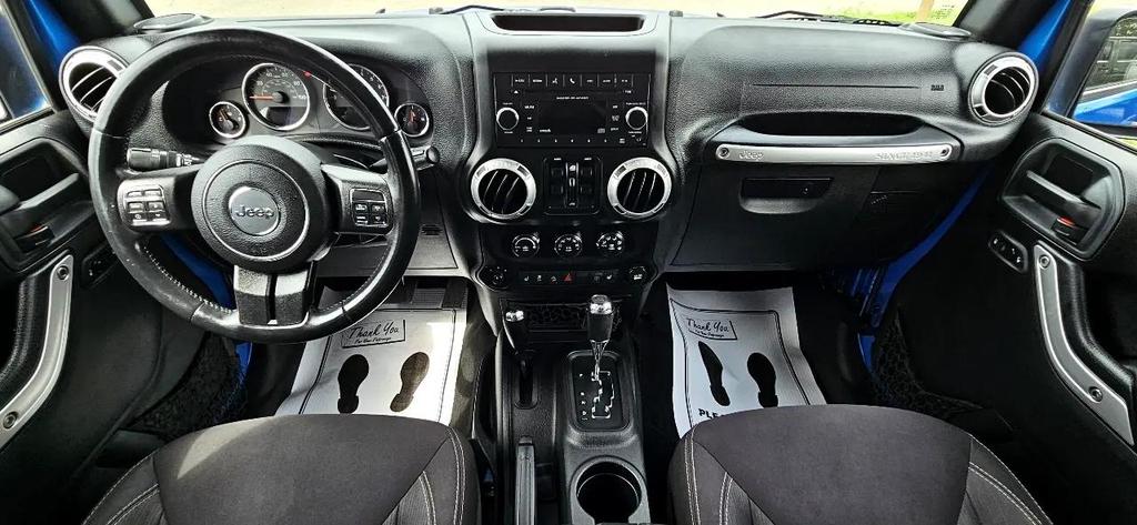 used 2015 Jeep Wrangler Unlimited car, priced at $18,700