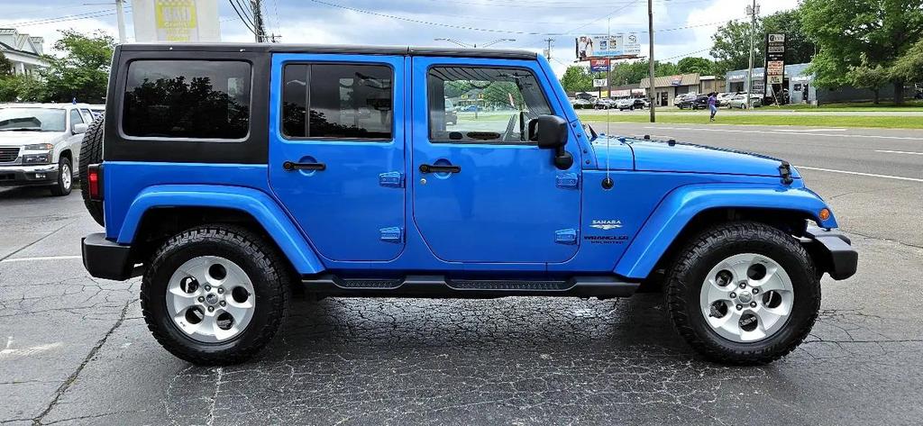 used 2015 Jeep Wrangler Unlimited car, priced at $18,700