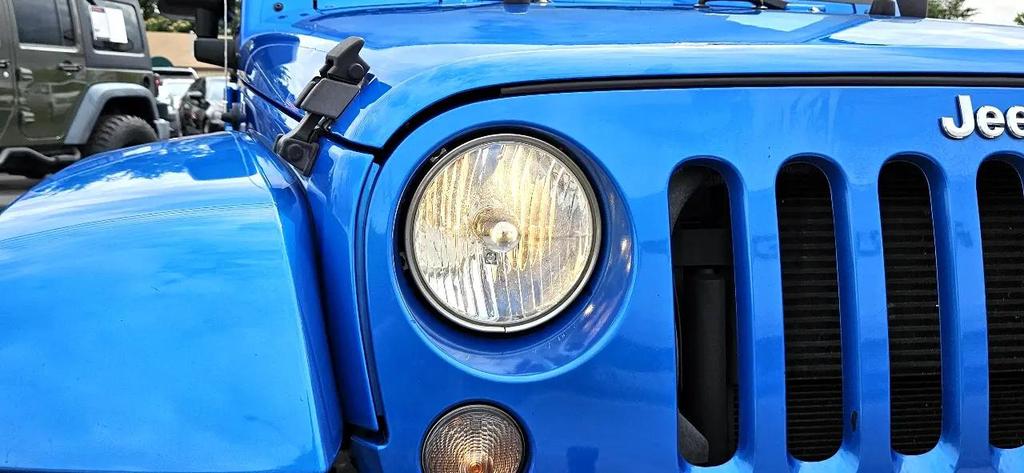 used 2015 Jeep Wrangler Unlimited car, priced at $18,700