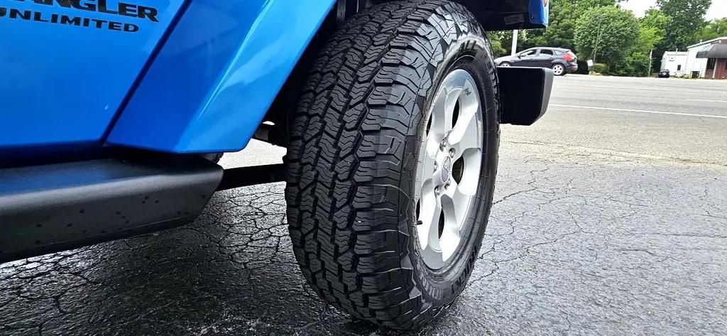 used 2015 Jeep Wrangler Unlimited car, priced at $18,700