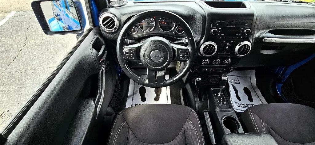 used 2015 Jeep Wrangler Unlimited car, priced at $18,700