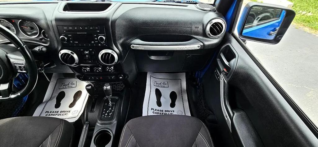 used 2015 Jeep Wrangler Unlimited car, priced at $18,700