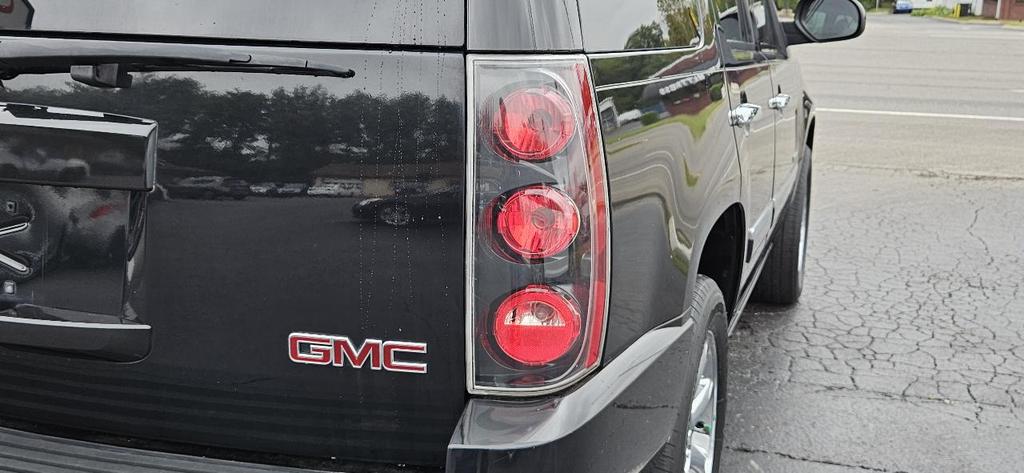 used 2013 GMC Yukon car, priced at $13,980