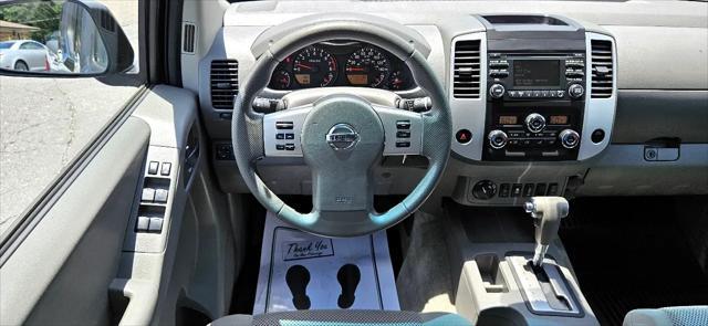 used 2014 Nissan Frontier car, priced at $16,580