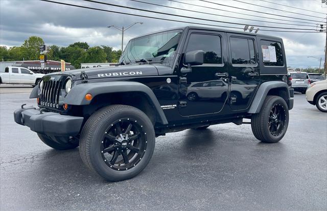 used 2011 Jeep Wrangler Unlimited car, priced at $13,980