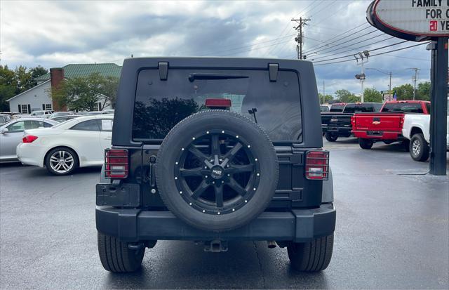 used 2011 Jeep Wrangler Unlimited car, priced at $13,980