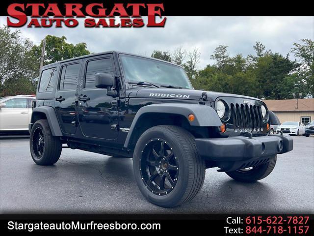 used 2011 Jeep Wrangler Unlimited car, priced at $13,980