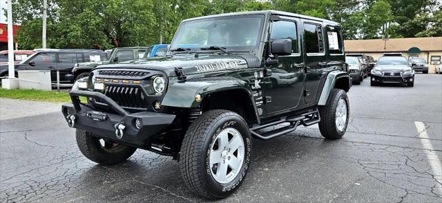 used 2011 Jeep Wrangler Unlimited car, priced at $17,900