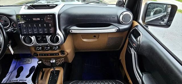 used 2011 Jeep Wrangler Unlimited car, priced at $17,900