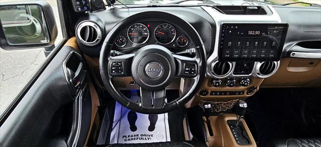 used 2011 Jeep Wrangler Unlimited car, priced at $17,900