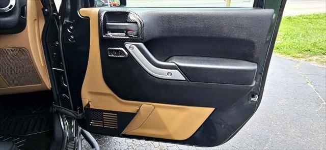 used 2011 Jeep Wrangler Unlimited car, priced at $17,900