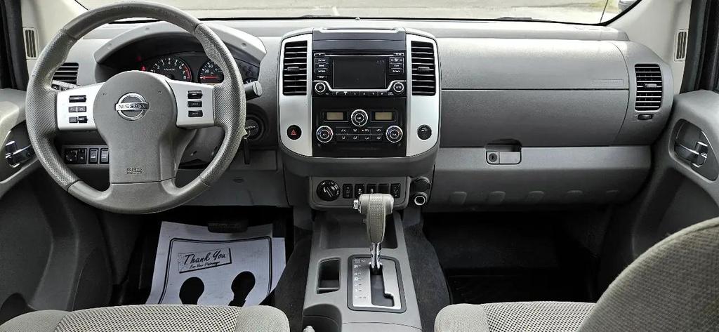 used 2015 Nissan Frontier car, priced at $15,710