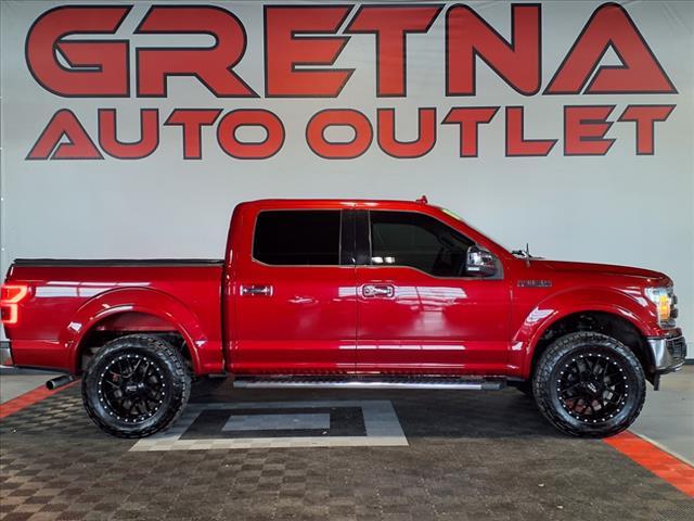 used 2018 Ford F-150 car, priced at $30,988