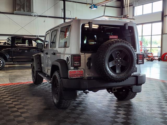 used 2013 Jeep Wrangler Unlimited car, priced at $13,988