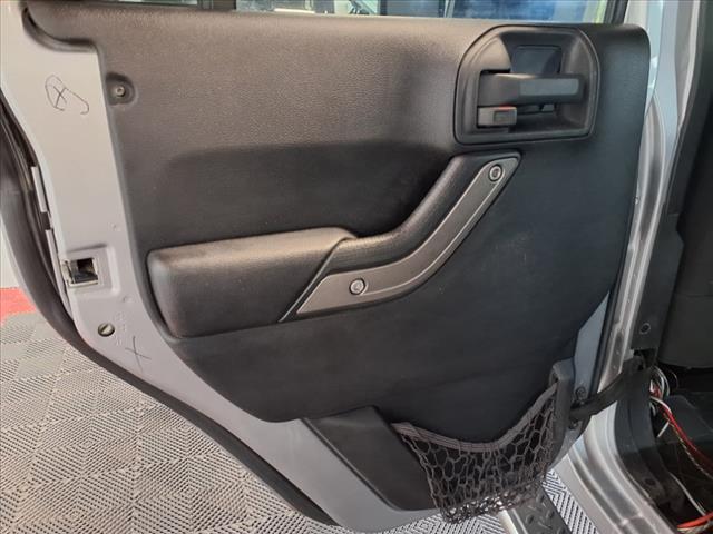 used 2013 Jeep Wrangler Unlimited car, priced at $13,988