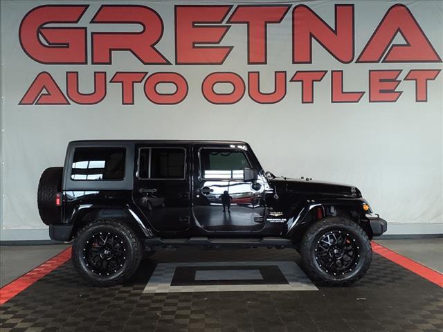 used 2014 Jeep Wrangler Unlimited car, priced at $25,988