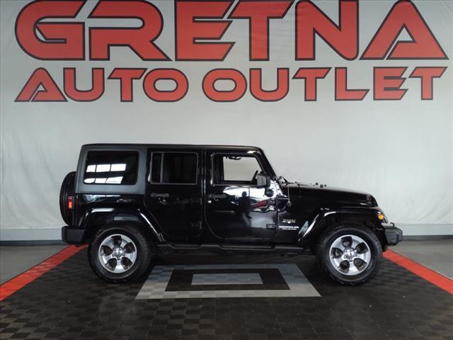 used 2016 Jeep Wrangler Unlimited car, priced at $30,988