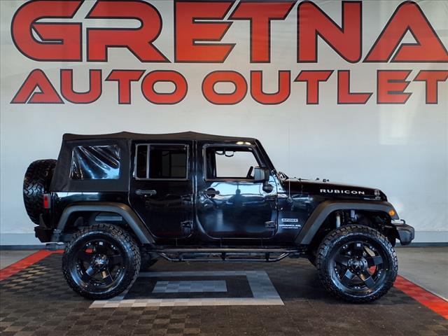 used 2012 Jeep Wrangler Unlimited car, priced at $15,988