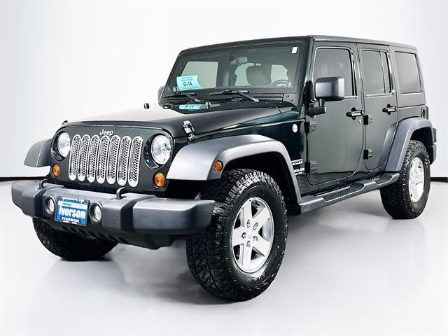 used 2012 Jeep Wrangler Unlimited car, priced at $16,495