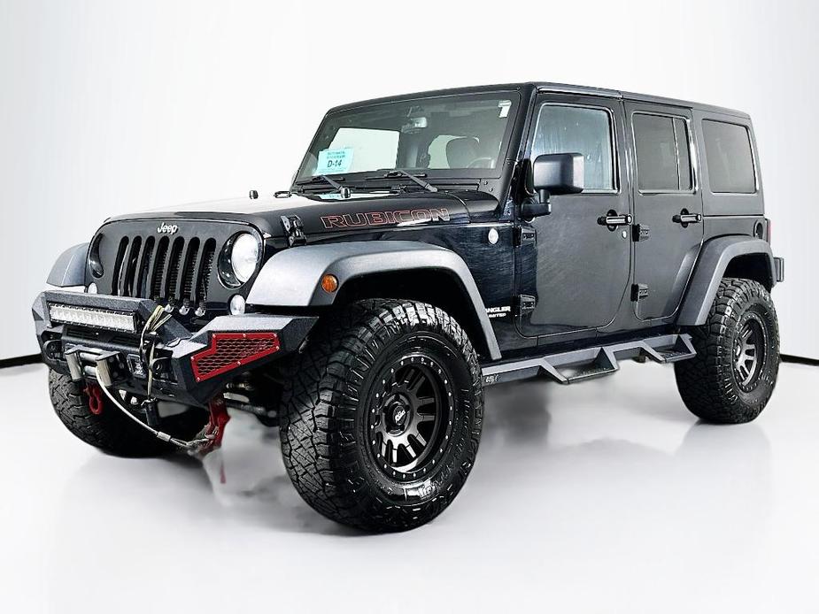 used 2014 Jeep Wrangler Unlimited car, priced at $21,895