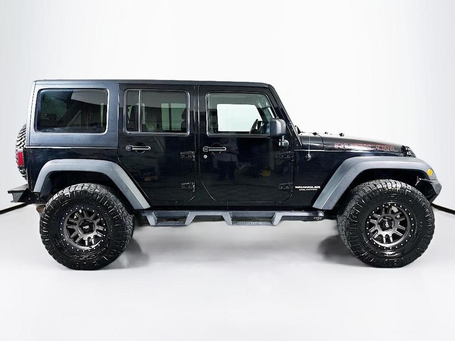 used 2014 Jeep Wrangler Unlimited car, priced at $21,895