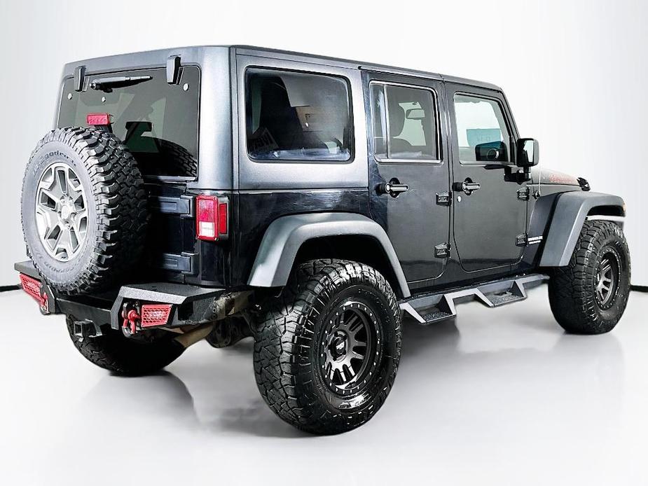 used 2014 Jeep Wrangler Unlimited car, priced at $21,895