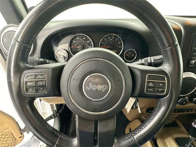 used 2013 Jeep Wrangler Unlimited car, priced at $14,501