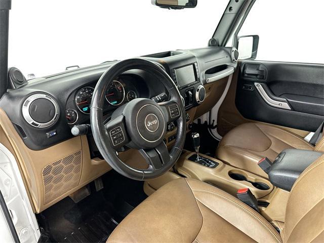 used 2013 Jeep Wrangler Unlimited car, priced at $14,501