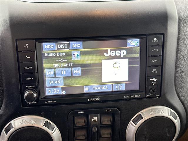 used 2013 Jeep Wrangler Unlimited car, priced at $14,501