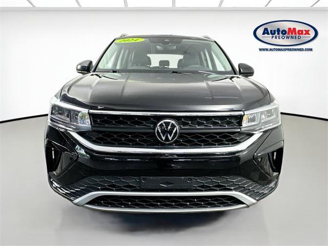 used 2024 Volkswagen Taos car, priced at $25,000