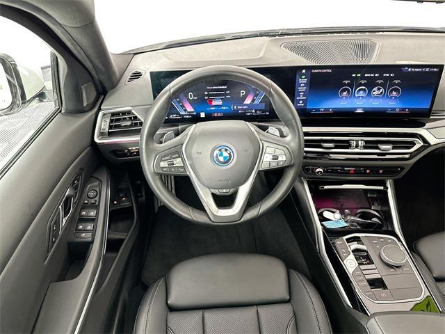 used 2024 BMW 330e car, priced at $34,000