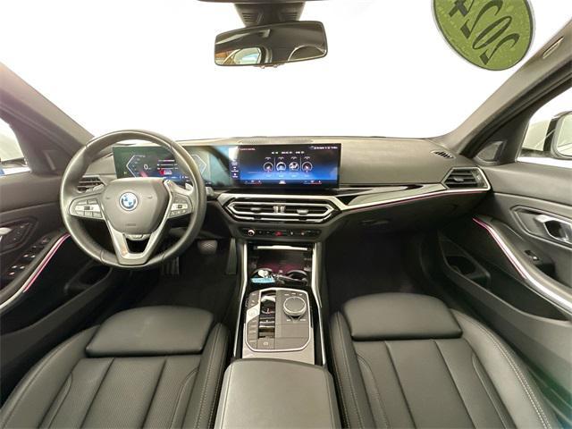 used 2024 BMW 330e car, priced at $34,000