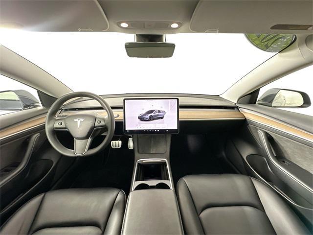 used 2022 Tesla Model 3 car, priced at $28,000